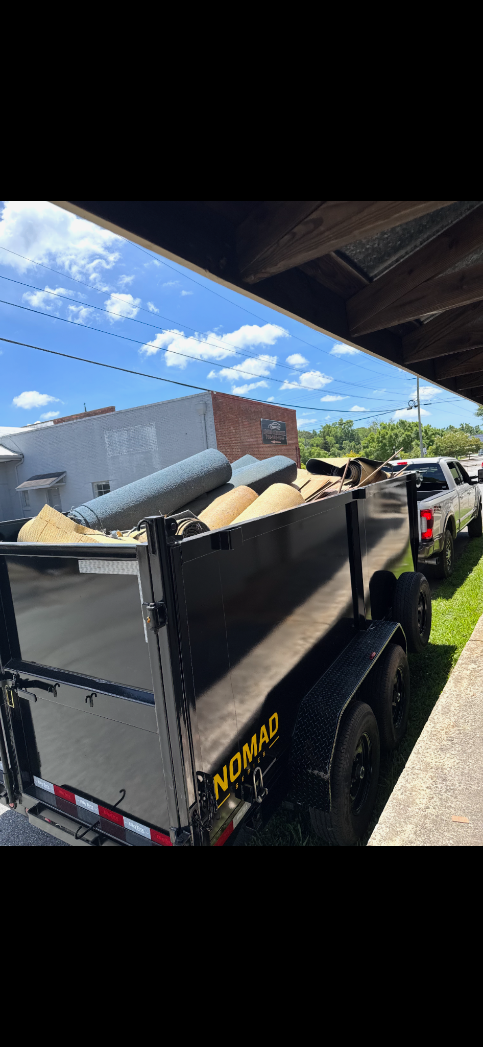 Need A Dump trailer loaded with rolled carpet and renovation debris