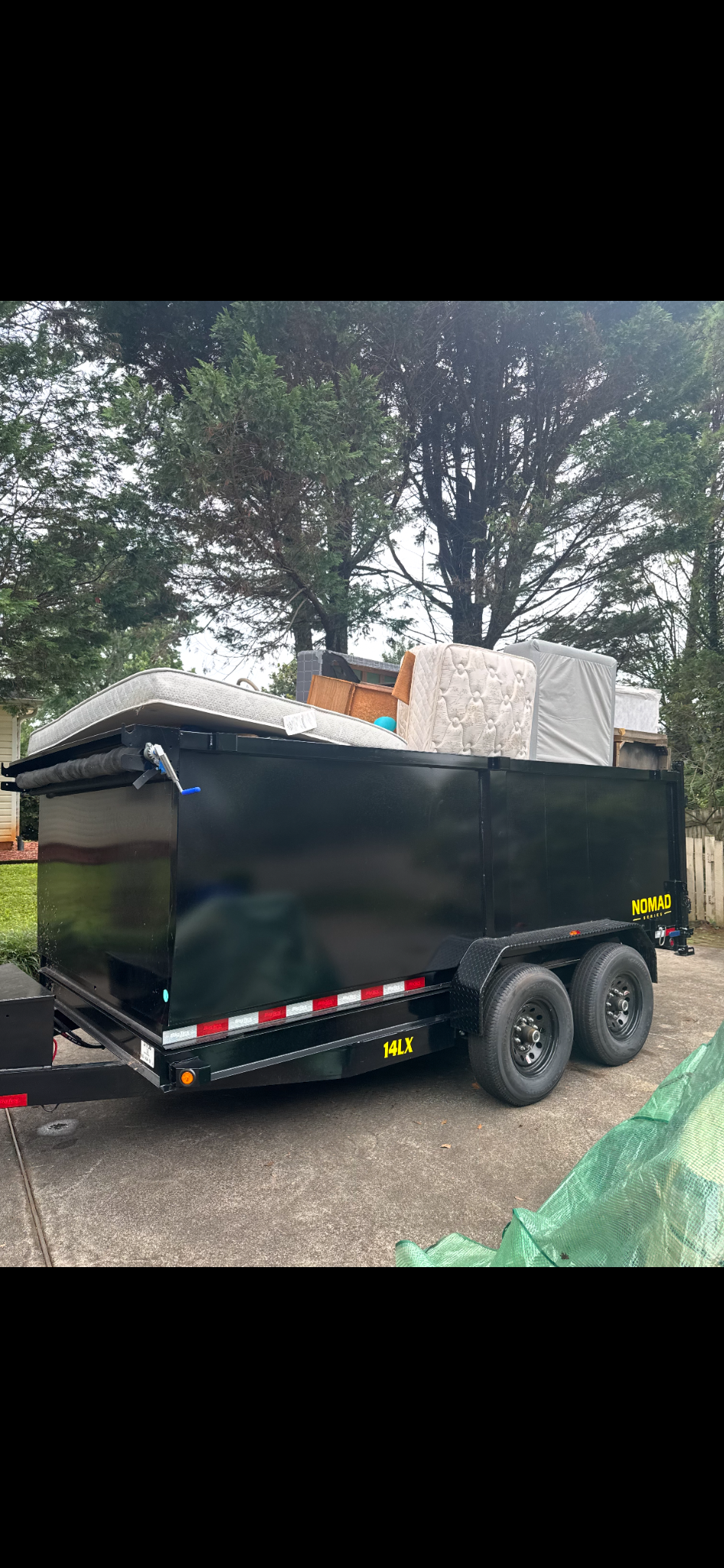 Need A Dump trailer loaded with mattresses and household furniture
